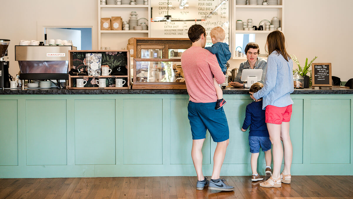 Family enjoying breakfast at Cup and Saucer in Brevard