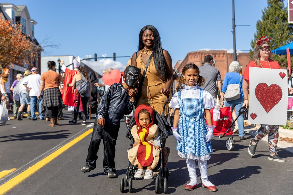 Family gathered together at Halloweenfest in Downtown Brevard to celebrate Halloween