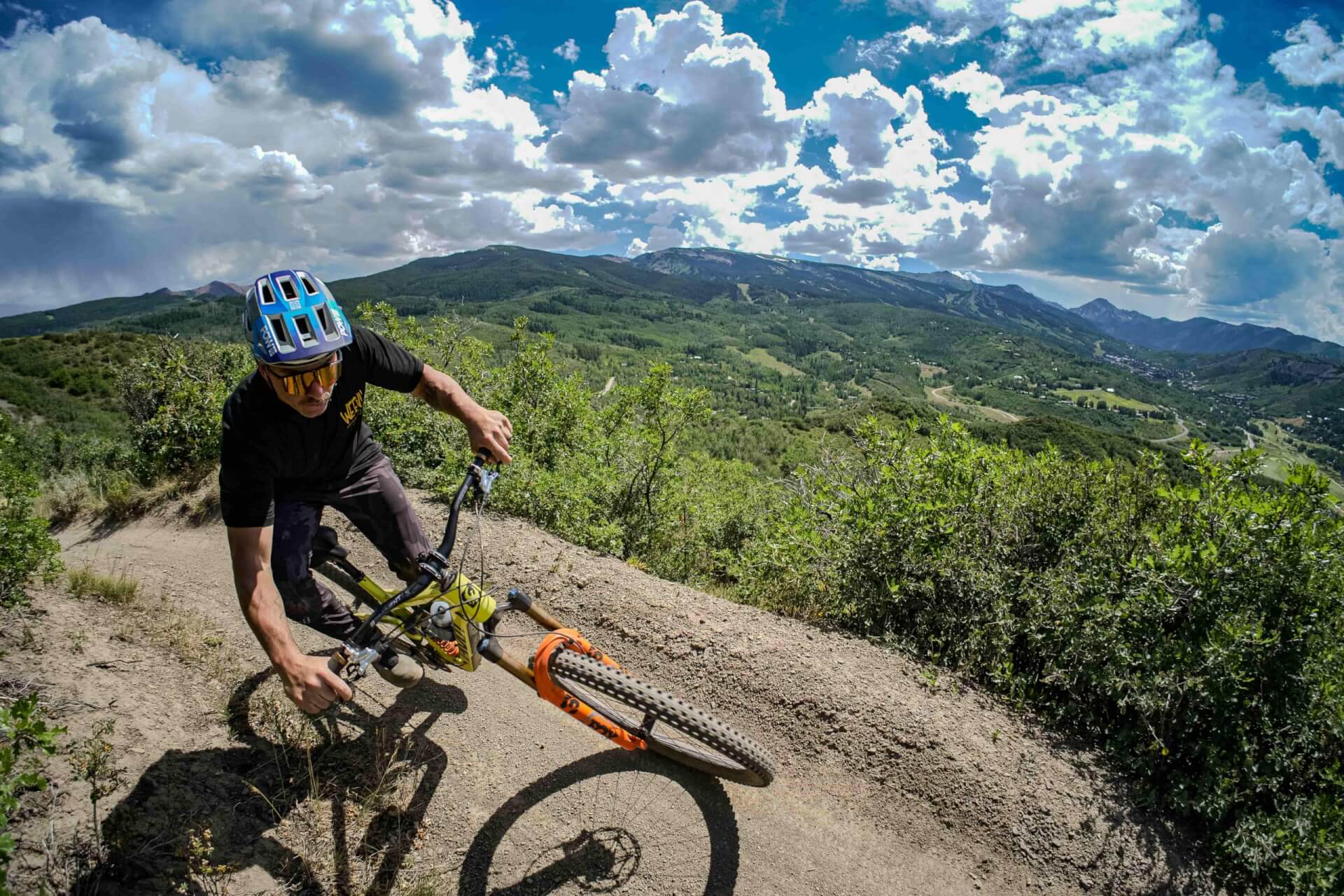 Professional mountain biker, Brice Shirbach riding on a rock face
