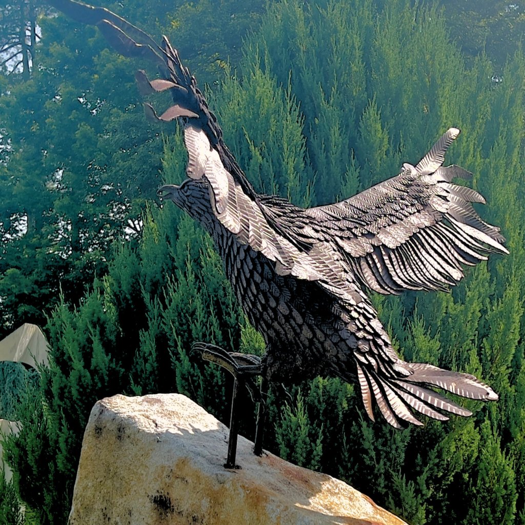 Golden Eagle sculpture at Transylvania Community Arts Council on the Brevard Sculpture Walk