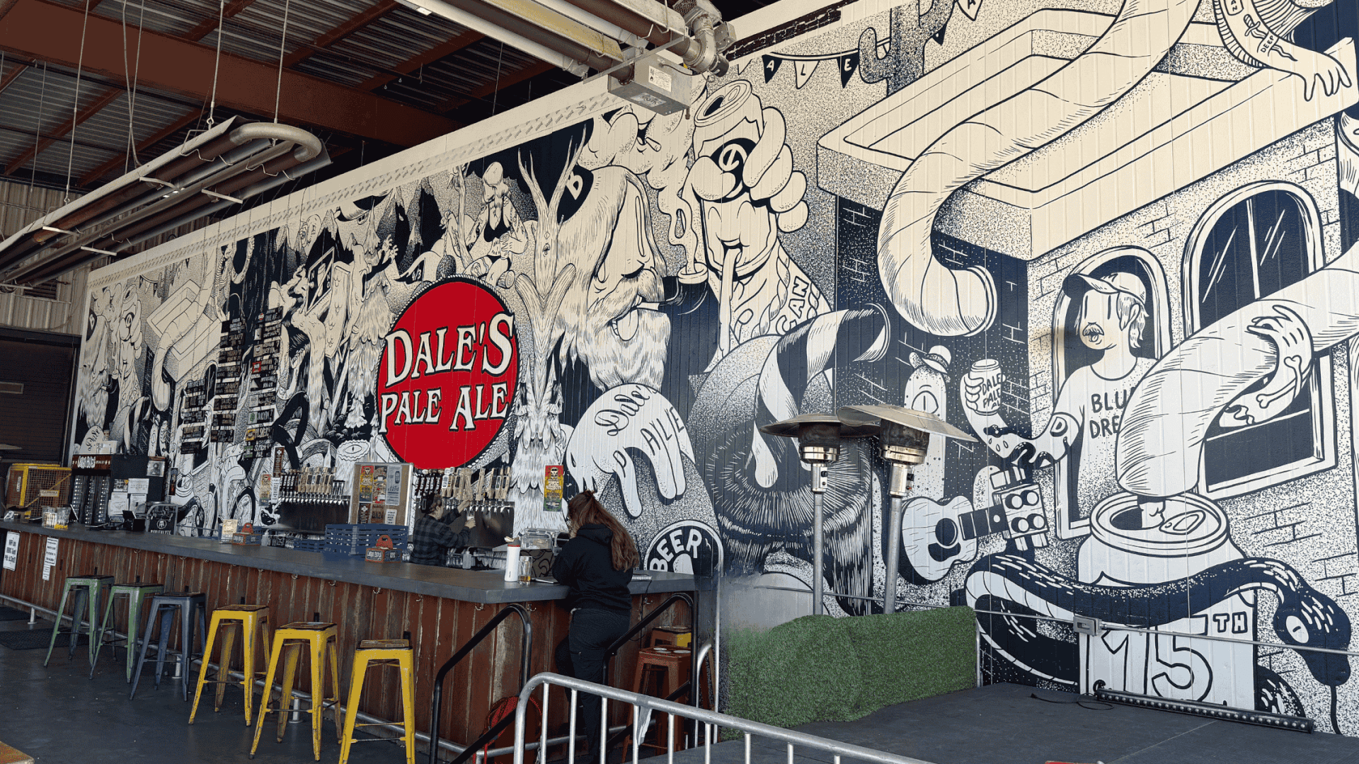 Mural at Oskar Blues Brewery, near Downtown Brevard featuring beer and music.
