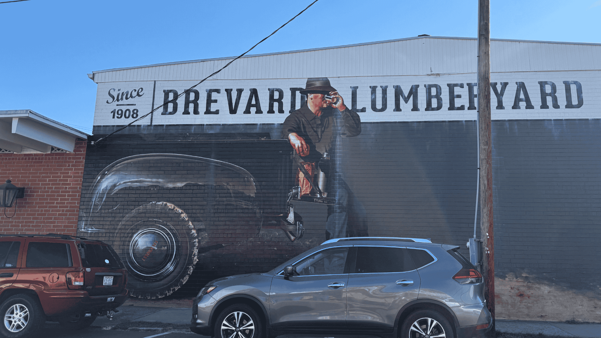 Brevard Lumberyard mural in the Lumberyard District across from 185 King Street, near Downtown Brevard.