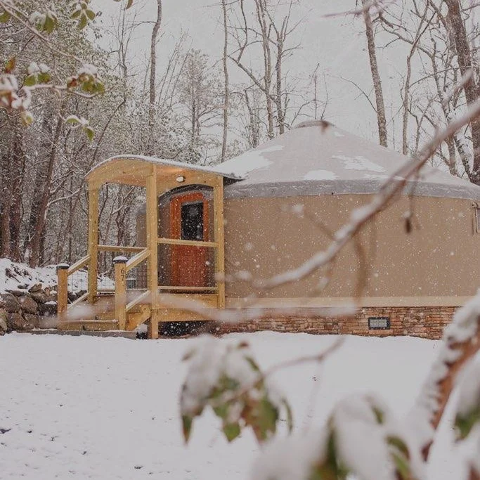 A snow covered yurt at DuPont Yurts near DuPont State Recreational Forest